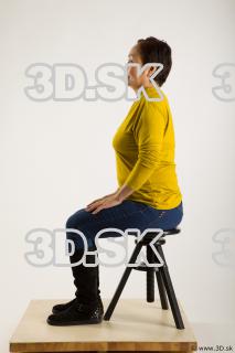 Sitting reference of yellow sweater blue jeans Gwendolyn 0001